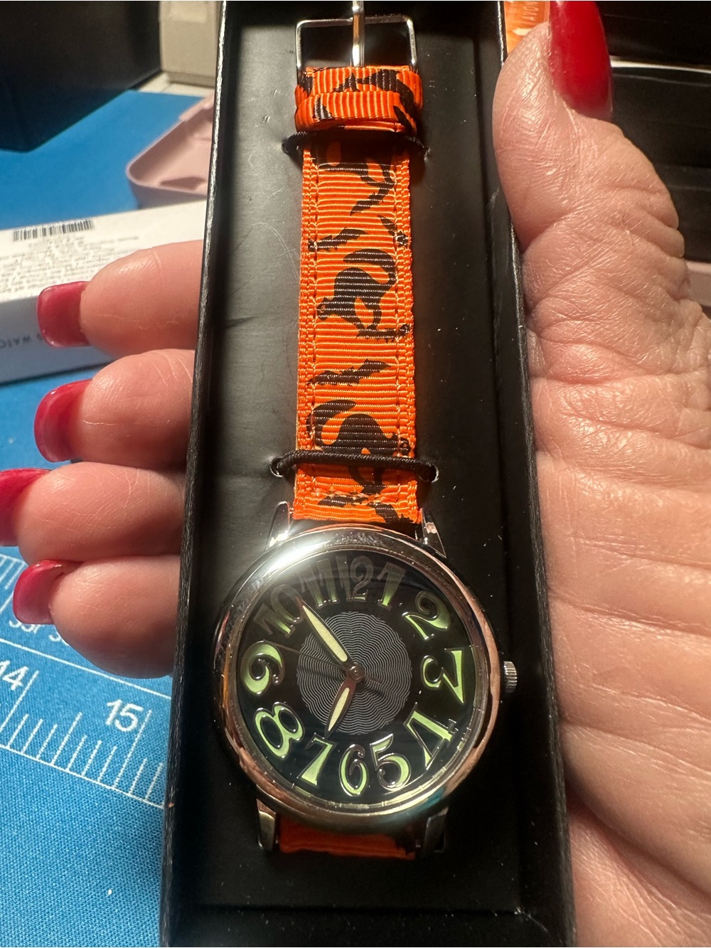 Avon Halloween band with glow in dark face numbers